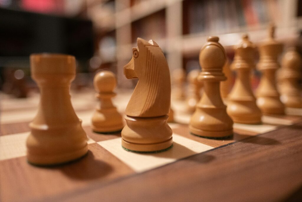 pexels-photo-29283135-29283135 Focus on wooden chess pieces on a chessboard, creating a strategic atmosphere.